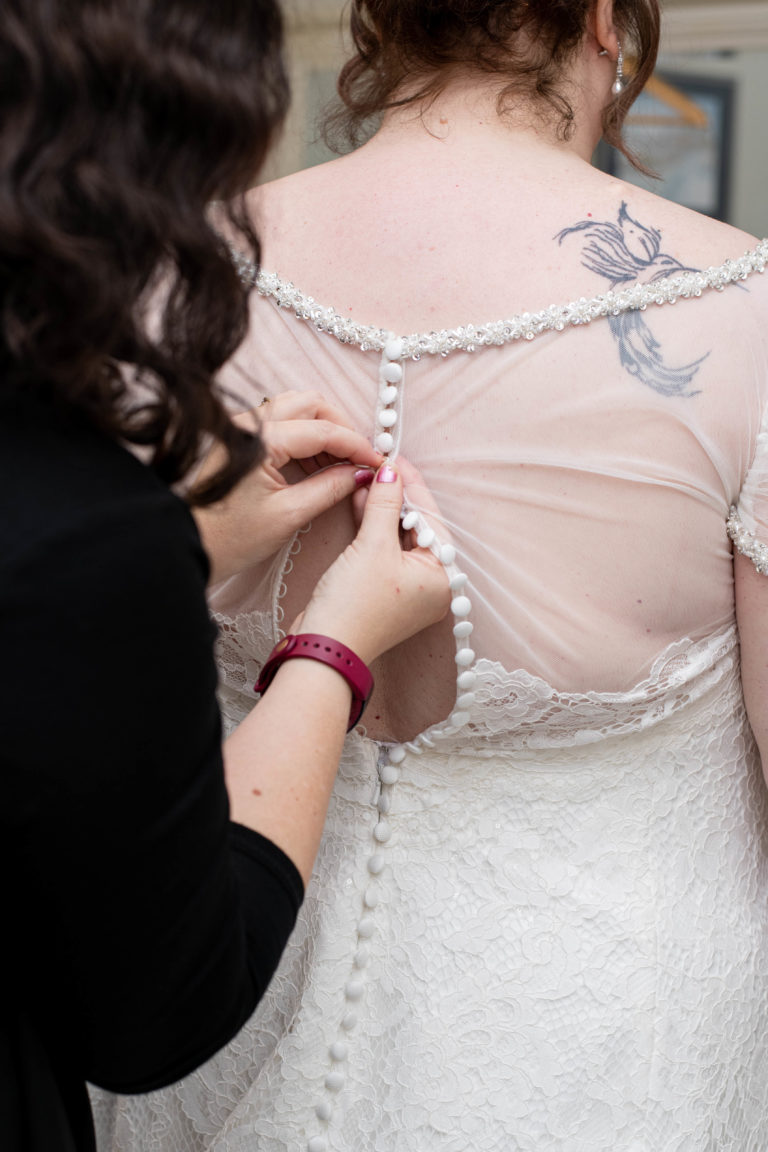 Bride getting ready in Catthorpe Manor’s bridal suite
