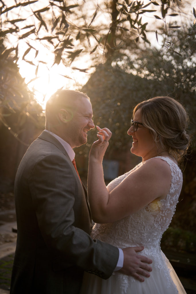 Couple portraits in the courtyard at golden hour