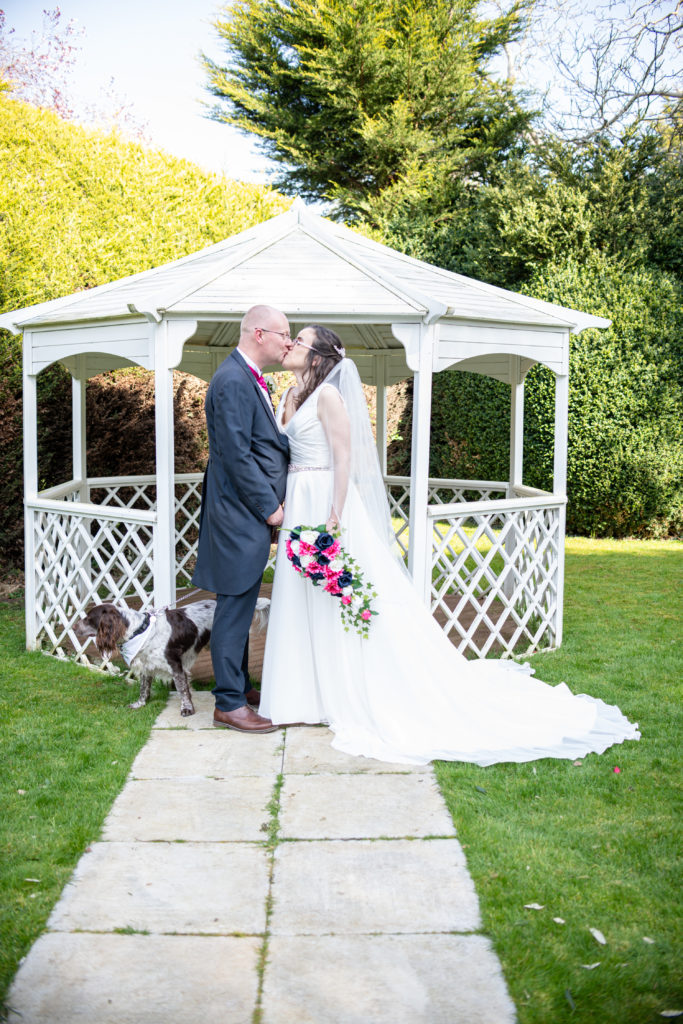 Outdoor wedding ceremony setup at Charlecote Pheasant Hotel on a sunny spring day