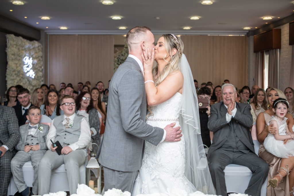 Newlyweds Jady and Perry sharing their first kiss as husband and wife
