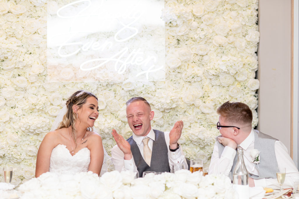Guests reacting with laughter during wedding speeches at Jady & Perry Wedding