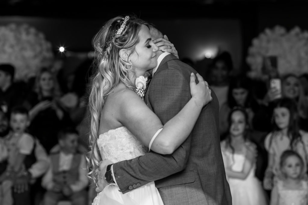 Wedding guests smiling and clapping during reception at Jady & Perry Wedding
