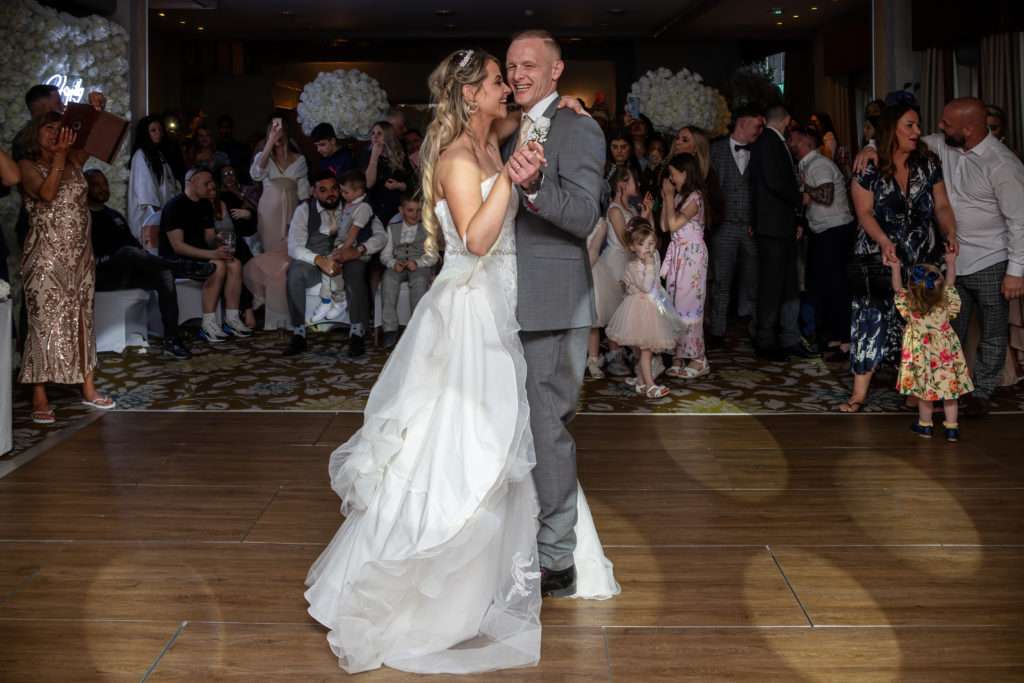 First dance of Jady and Perry under warm fairy lights at Charlecote Pheasant Hotel