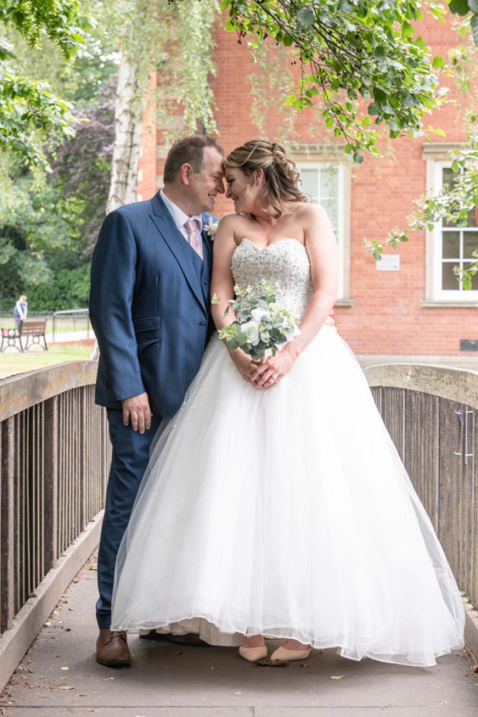 Cally and Paul walking hand-in-hand after the ceremony