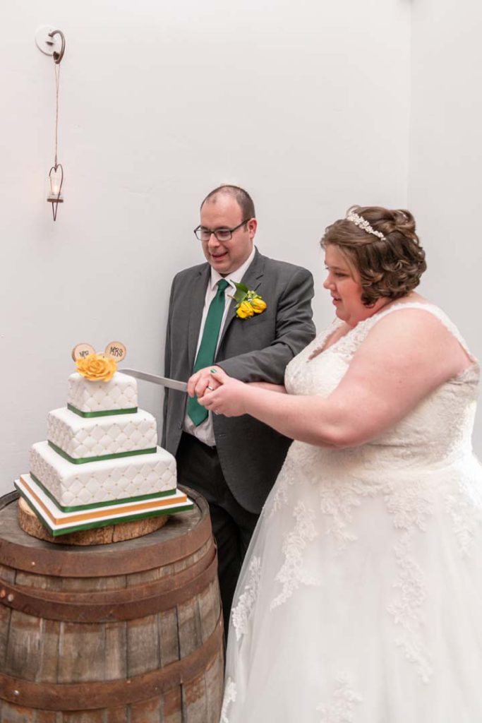 Spring-themed wedding cake with floral accents