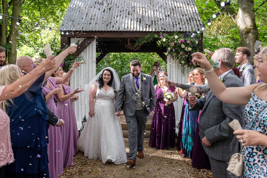Natural and unposed confetti of newly weds - LB Photography