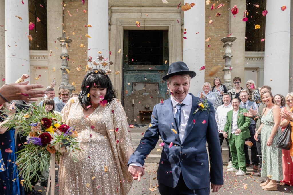 Wedding photography portfolio Warwickshire capturing a joyful confetti moment