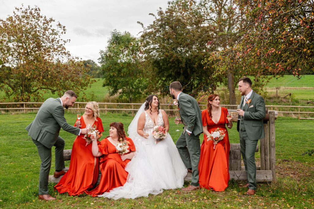 relaxed posed wedding group photo with a natural wedding photography feel