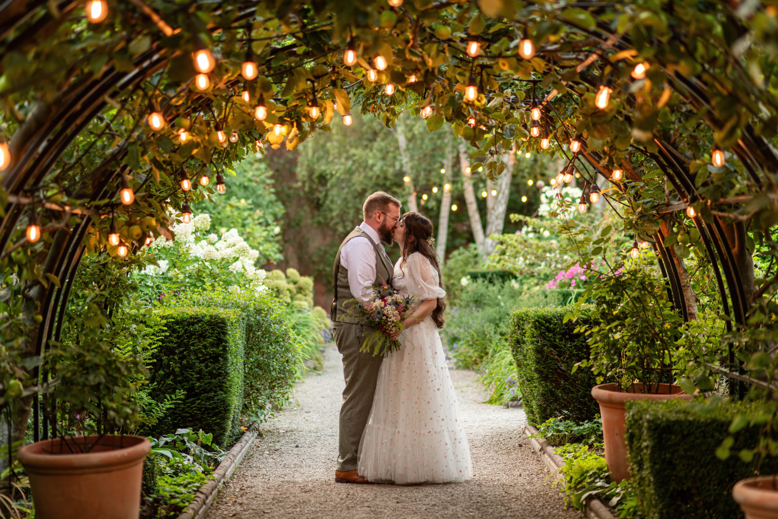 Award-winning golden hour wedding kiss