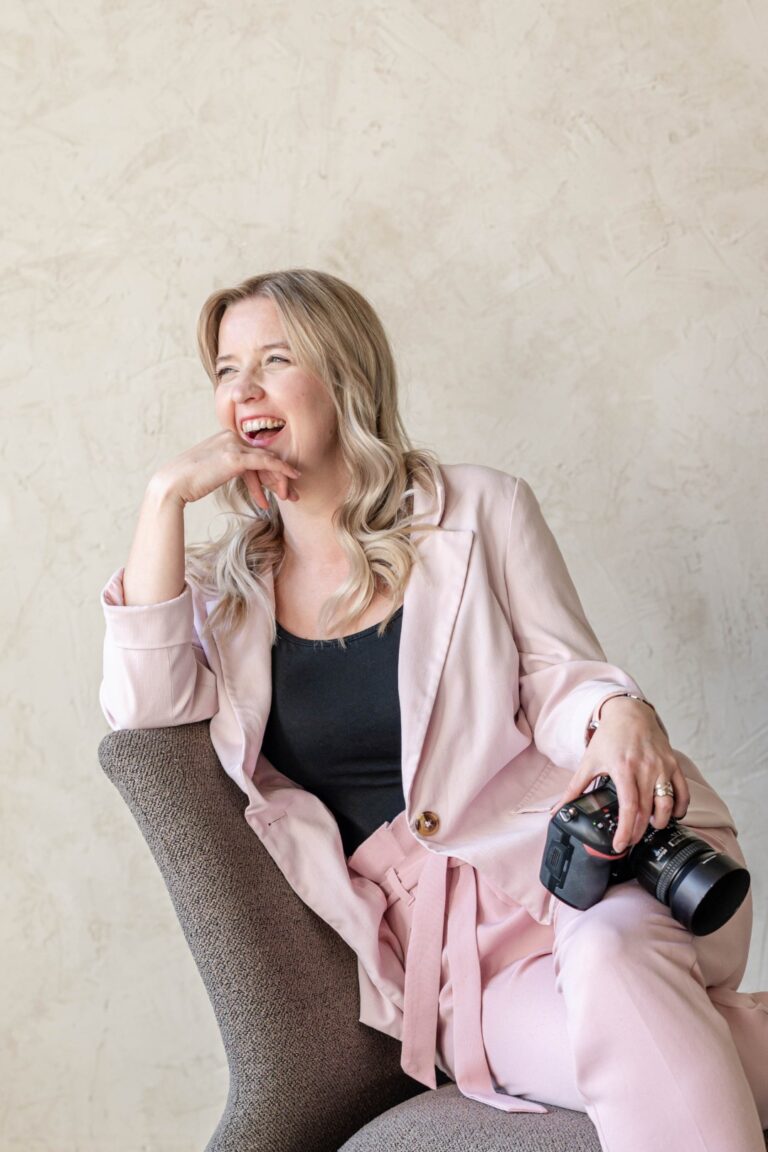 Leanne Brookes, wedding photographer in her signature pink jacket